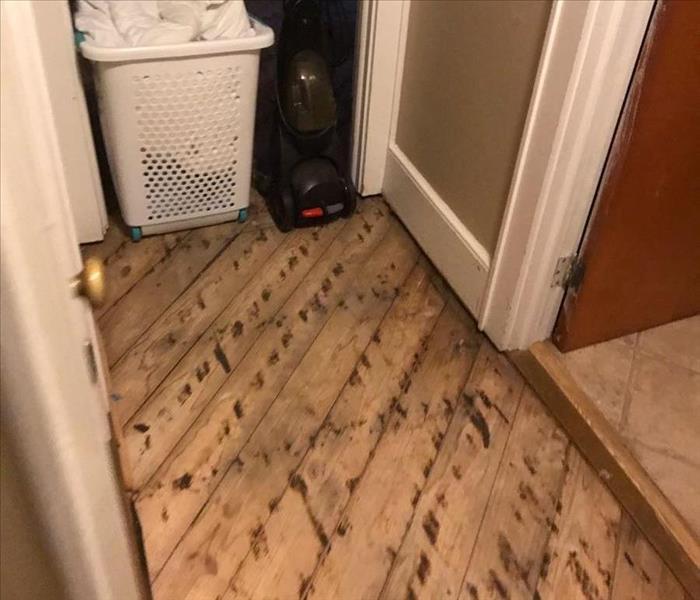 Hallway with the subfloor showing