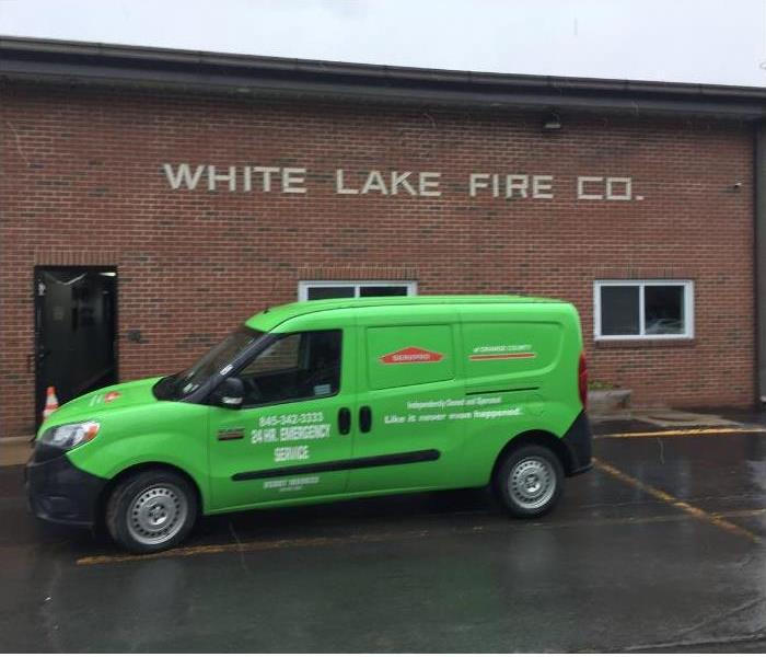 SERVPRO vehicle in front of a Fire department building